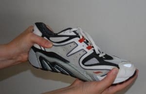 Heel counter squeeze test of running shoe